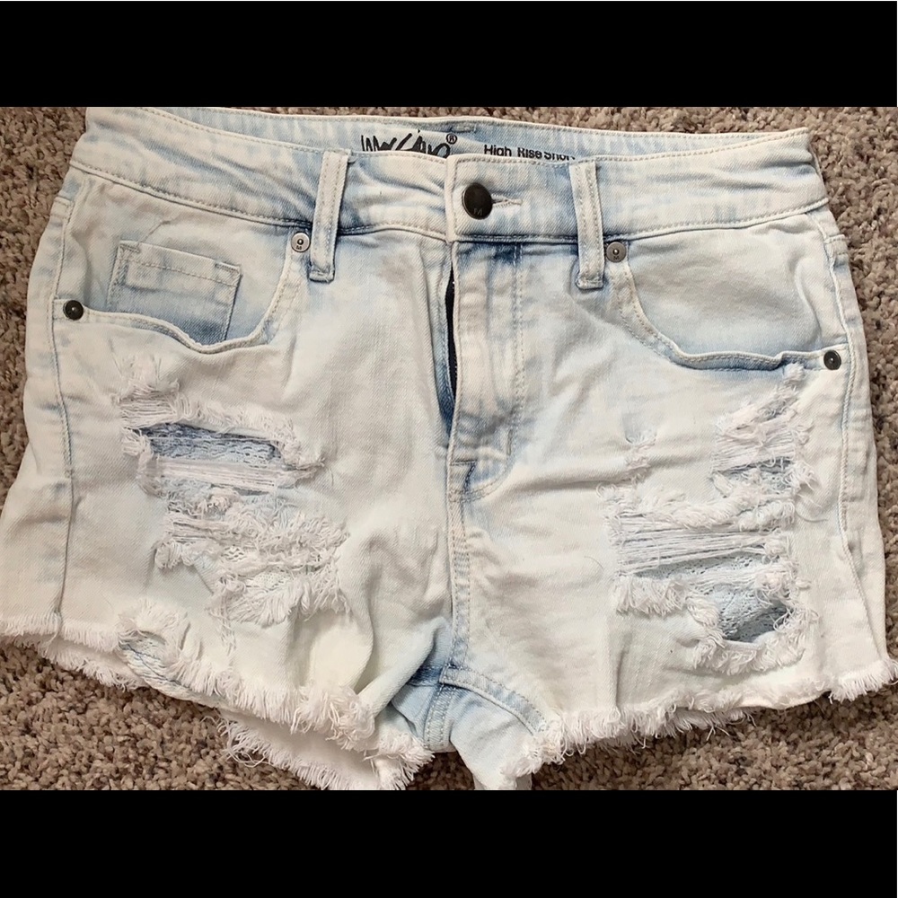 Distressed light wash jeans